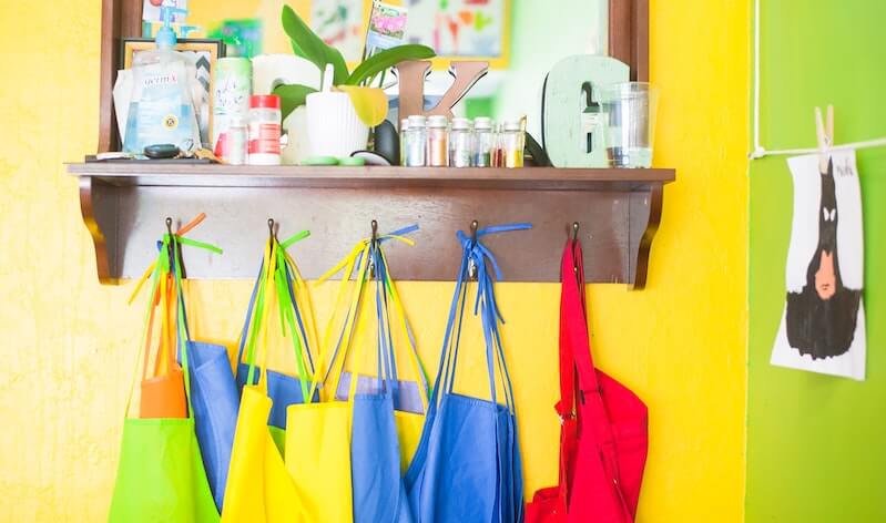 Photo of aprons hanging in a classroom