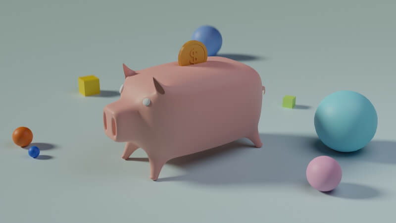 Image of a piggy bank surrounded by colorful shapes