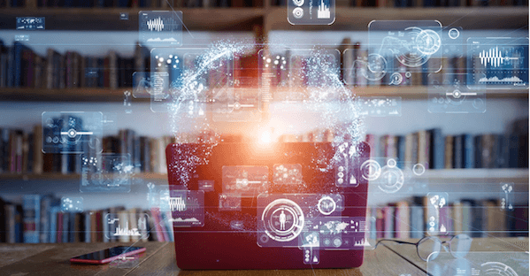 Image of a laptop and books.